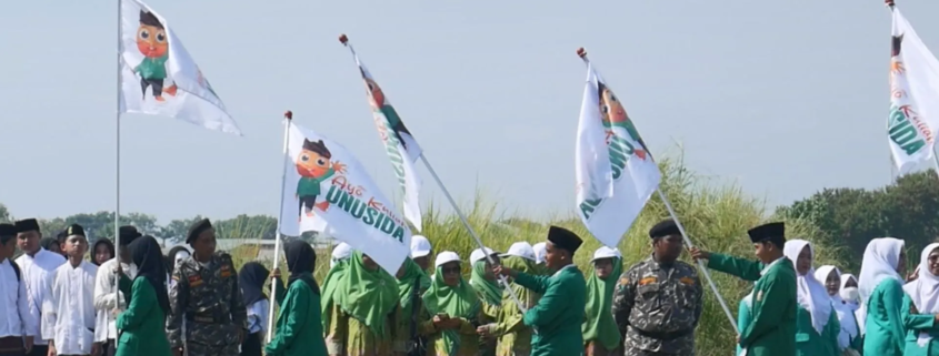 Semarak Hari Santri 2025, UNUSIDA Resmi Buka Pendaftaran Mahasiswa Baru Tahun Akademik 2026/2027 1 Pengenalan Maskot PMB UNUSIDA Jadi Tanda Kick Off PMB UNUSIDA saat Upacara Hari Santri 2025 (Foto: Humas UNUSIDA)